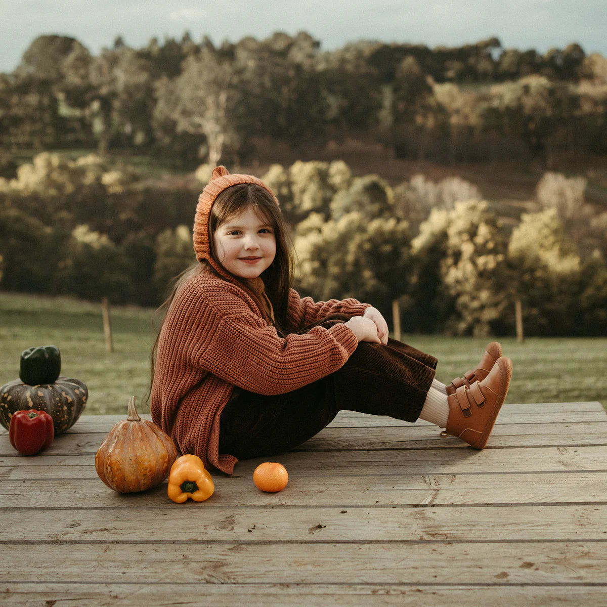 Woolly Kids AW 24 Scene 2 - Sunlit Meadow